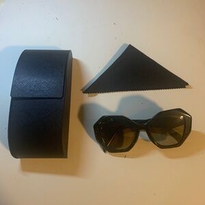 Prada sunglasses black and yellow marbled